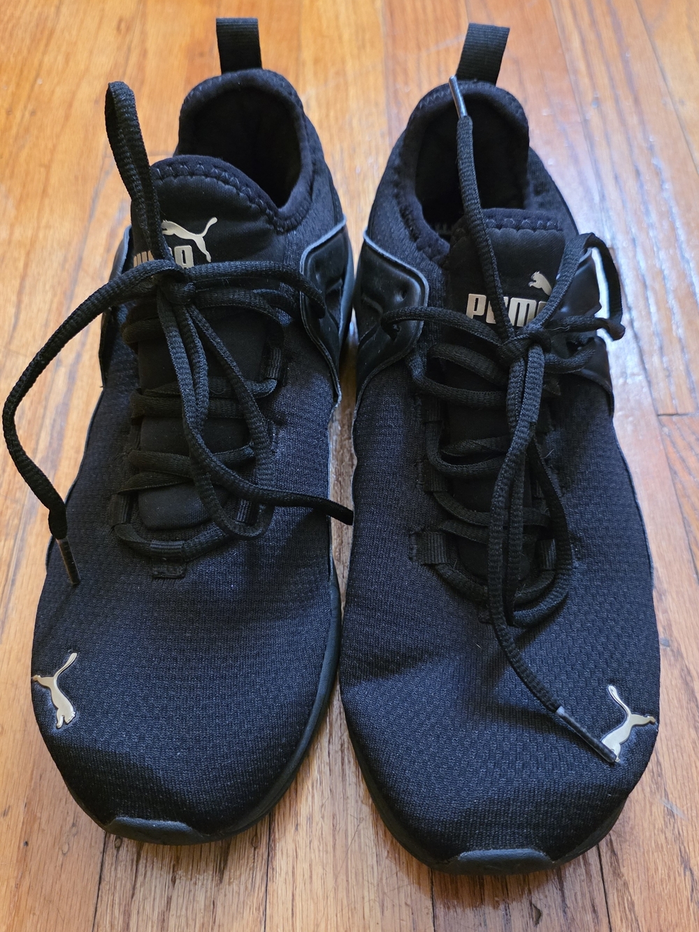 Puma Women’s Black Sneakers with White Puma Logos